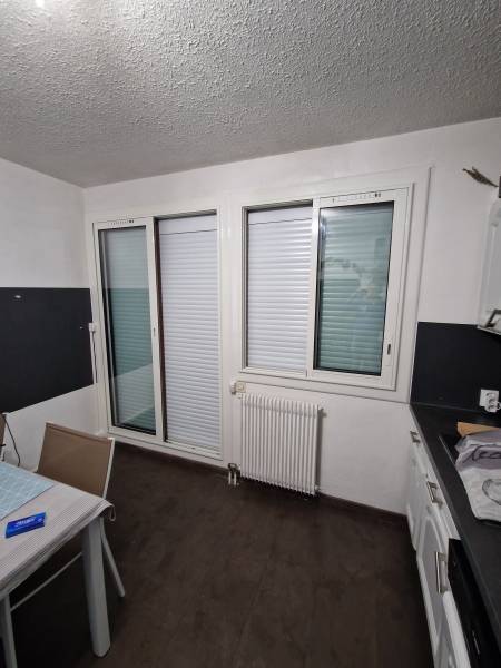 Pose fenêtre bicolore à la garde