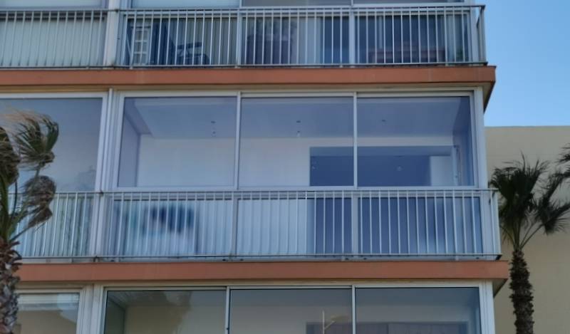 Après mise en place des menuiseries pour fermeture de balcon